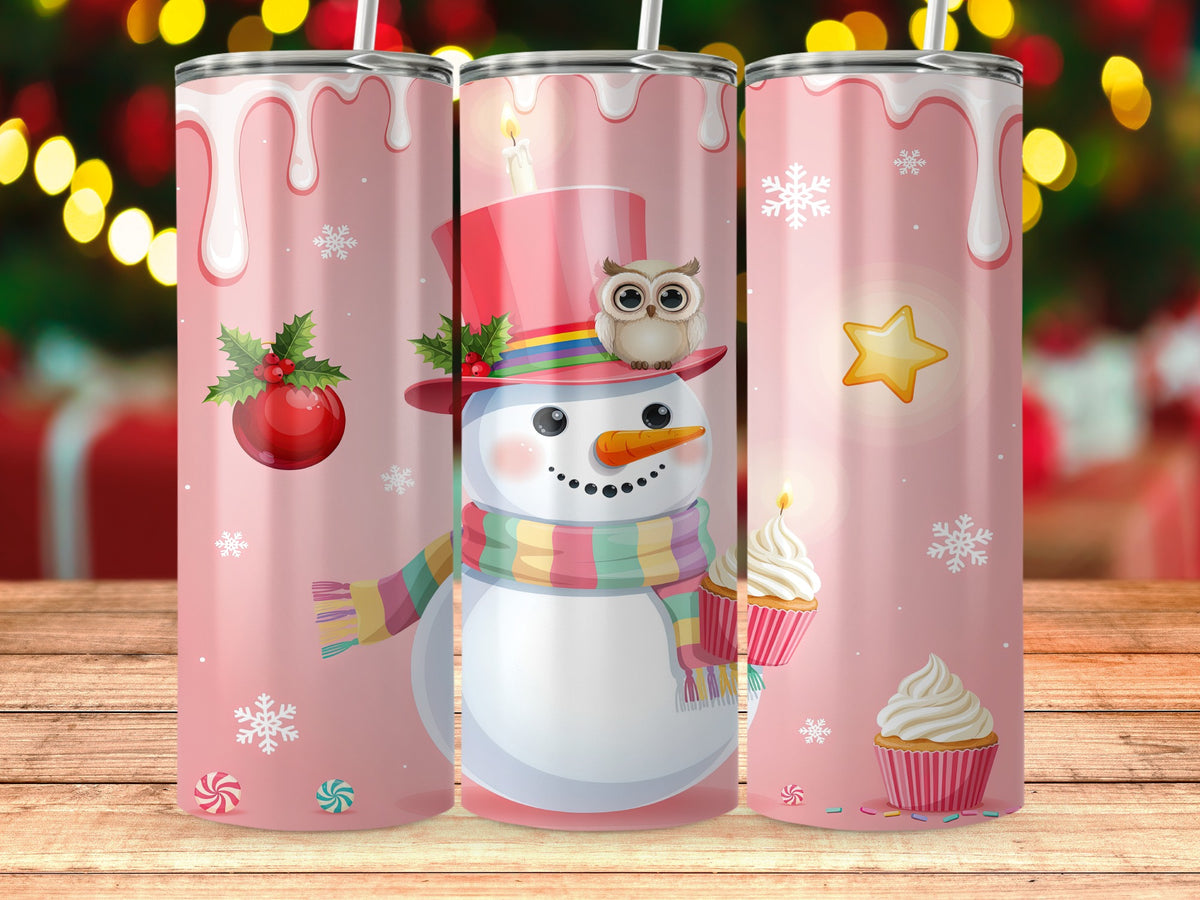 Pink tumbler with festive snowman, owl, cupcakes, and Christmas decorations.