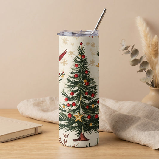 Christmas tree tumbler with red birds, snowflakes, and a silver straw.