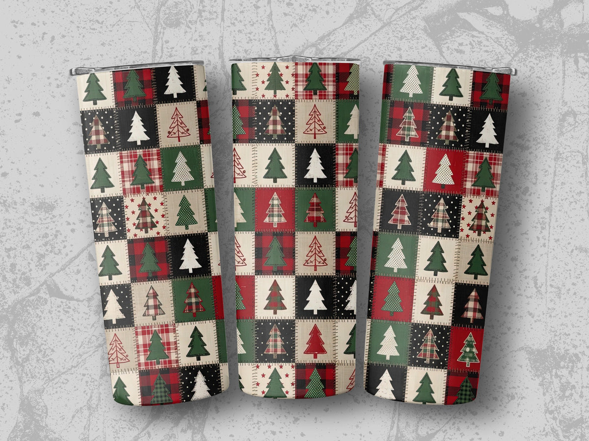 Three tumblers with a patchwork pattern of Christmas trees and plaid designs.