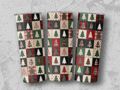 Three tumblers with a patchwork pattern of Christmas trees and plaid designs.