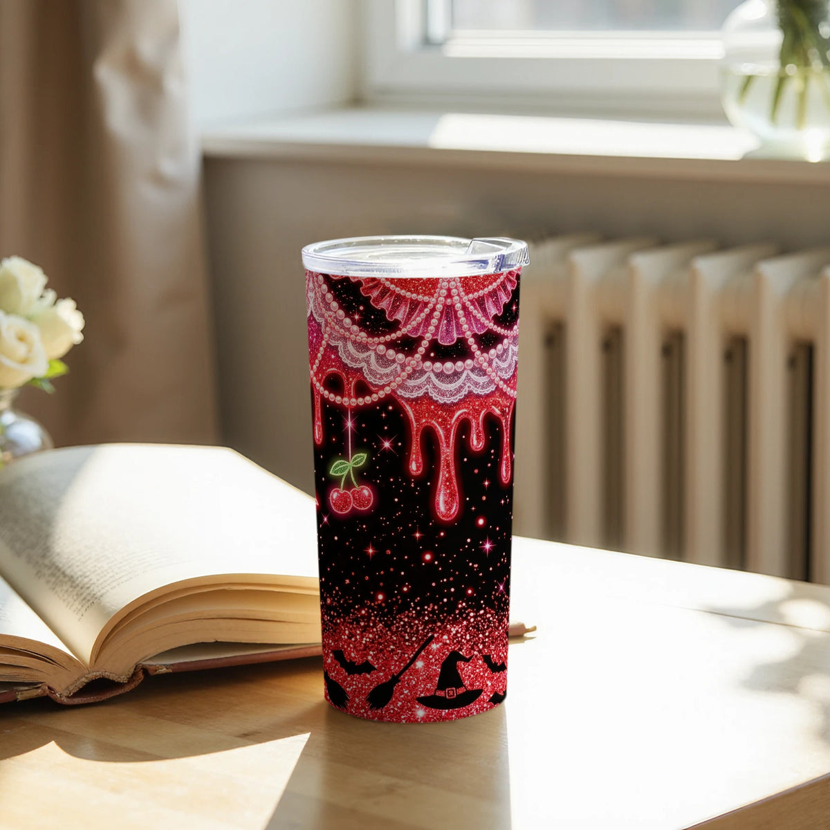 Red glitter tumbler with dripping red pattern, cherries, bats, and witch hats.