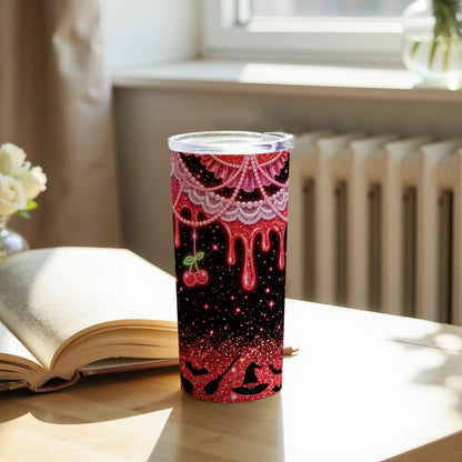 Red glitter tumbler with dripping red pattern, cherries, bats, and witch hats.
