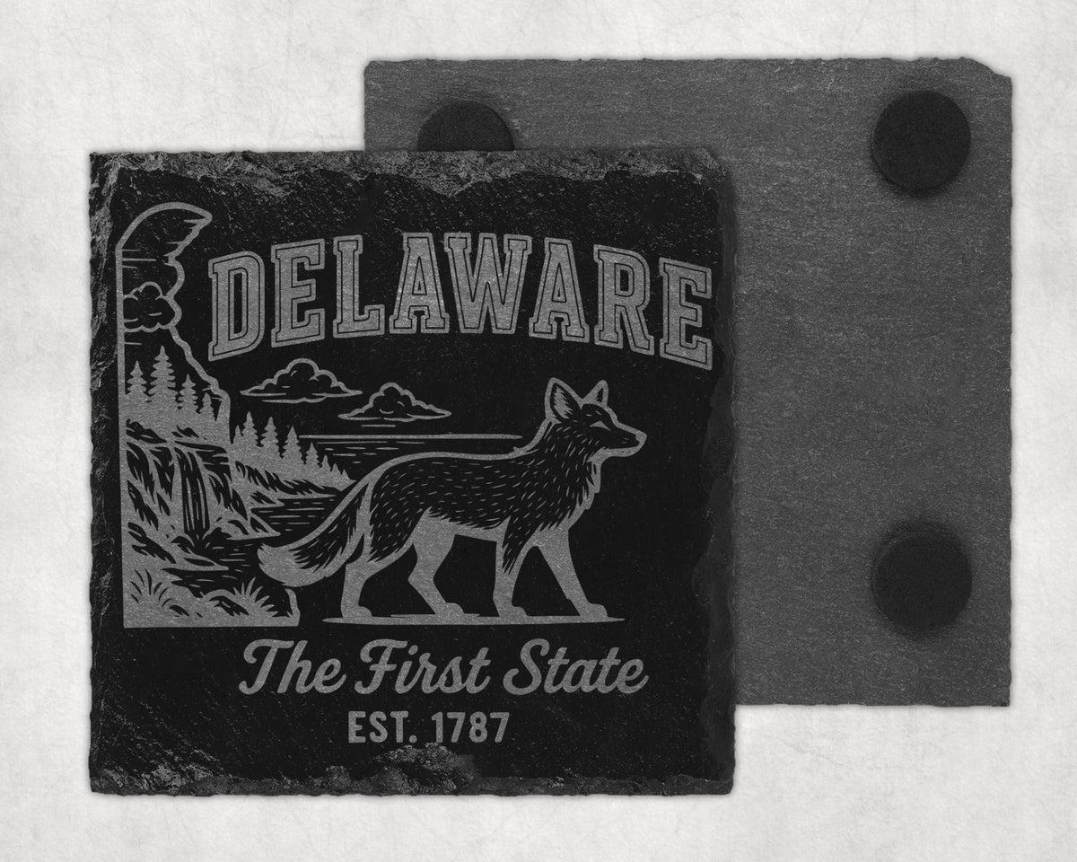 Black slate coaster with engraved Delaware landscape, fox, and text.