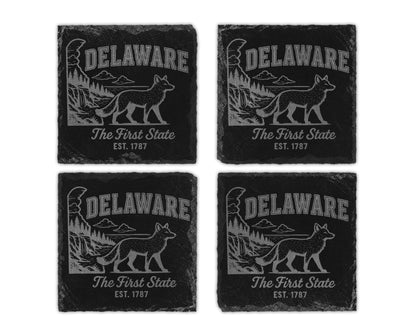 Four slate coasters engraved with "Delaware The First State EST. 1787" and a fox.
