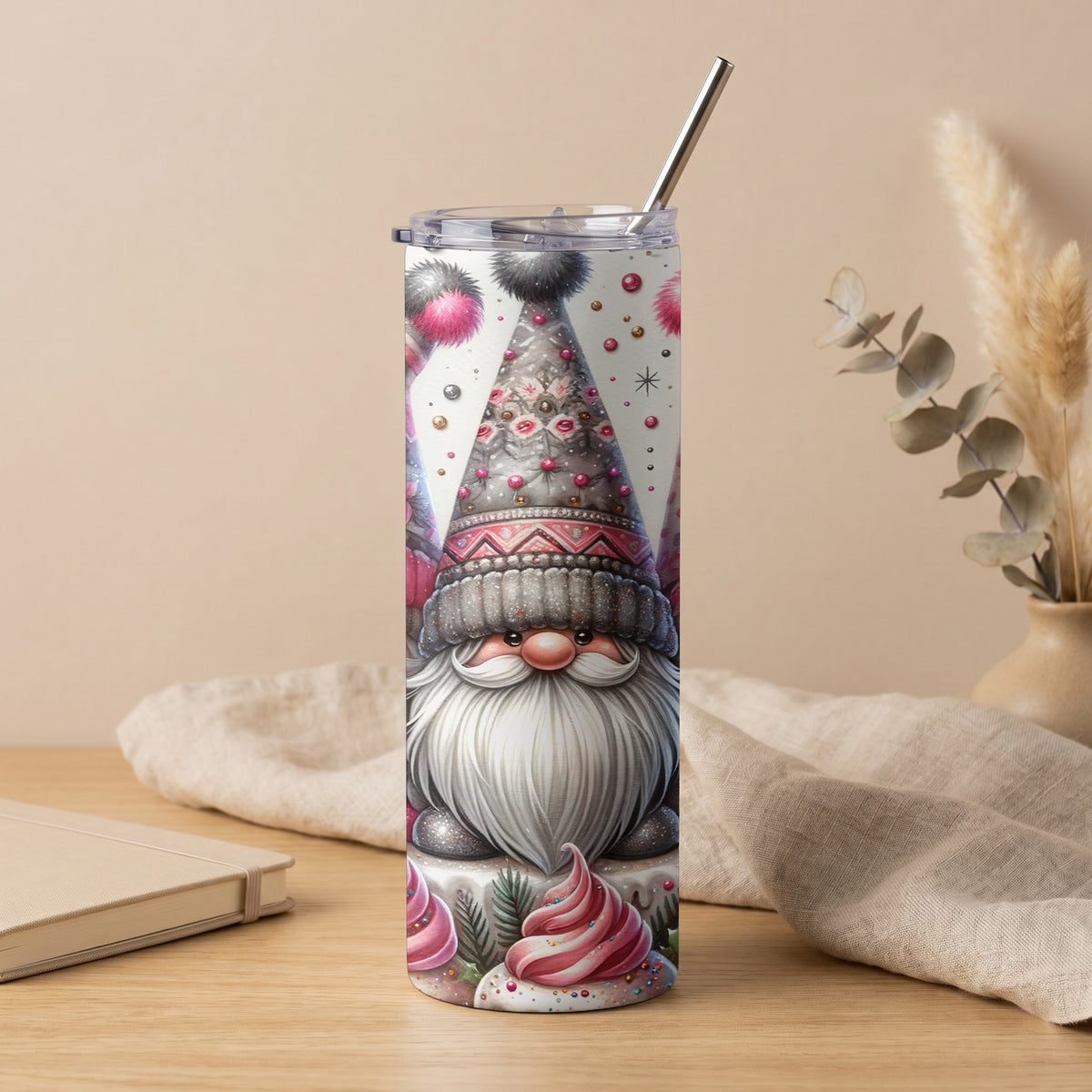 Tumbler with a watercolor gnome design and a stainless steel straw.