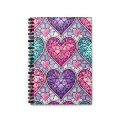 Spiral bound notebook with a stained glass heart pattern in pink, purple, and teal.