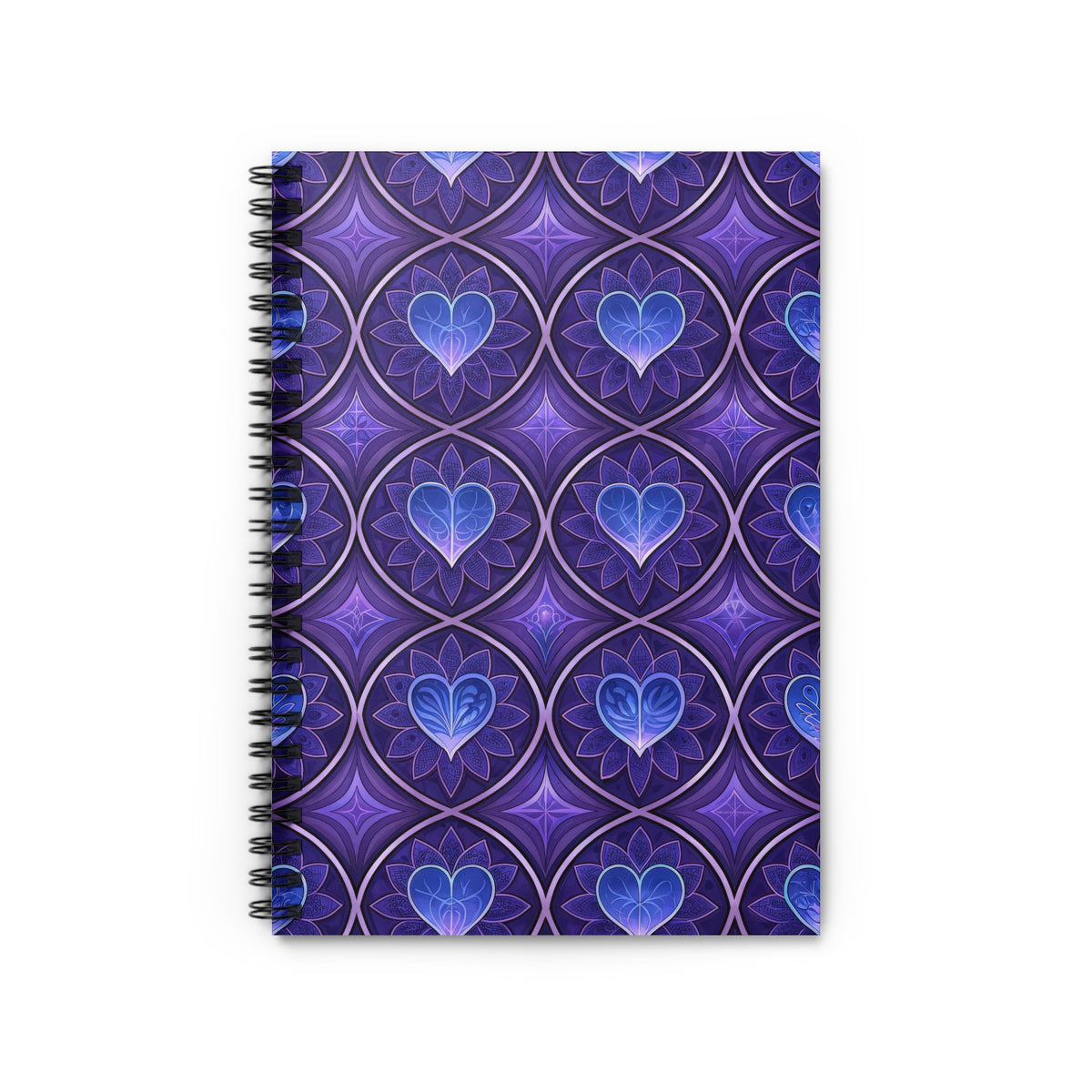 Spiral-bound notebook with purple and blue patterned cover featuring hearts.