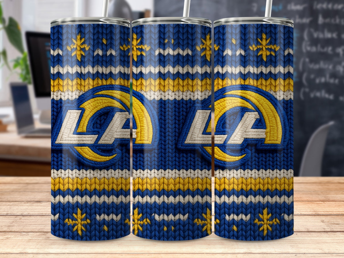 LA Rams logo on a blue, yellow, and white knitted tumbler with snowflakes.