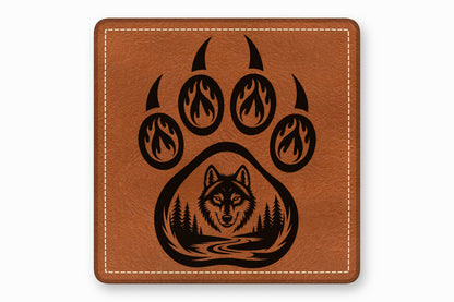 Brown square leather patch with white stitched border and a black laser-engraved wolf and claw print.