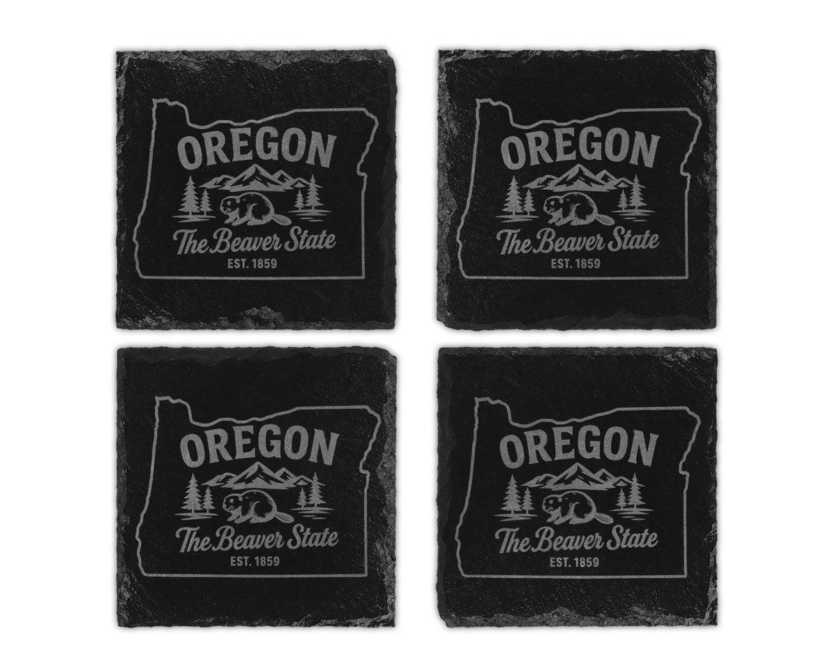 Four slate coasters featuring the Oregon state outline with beaver and mountains design.