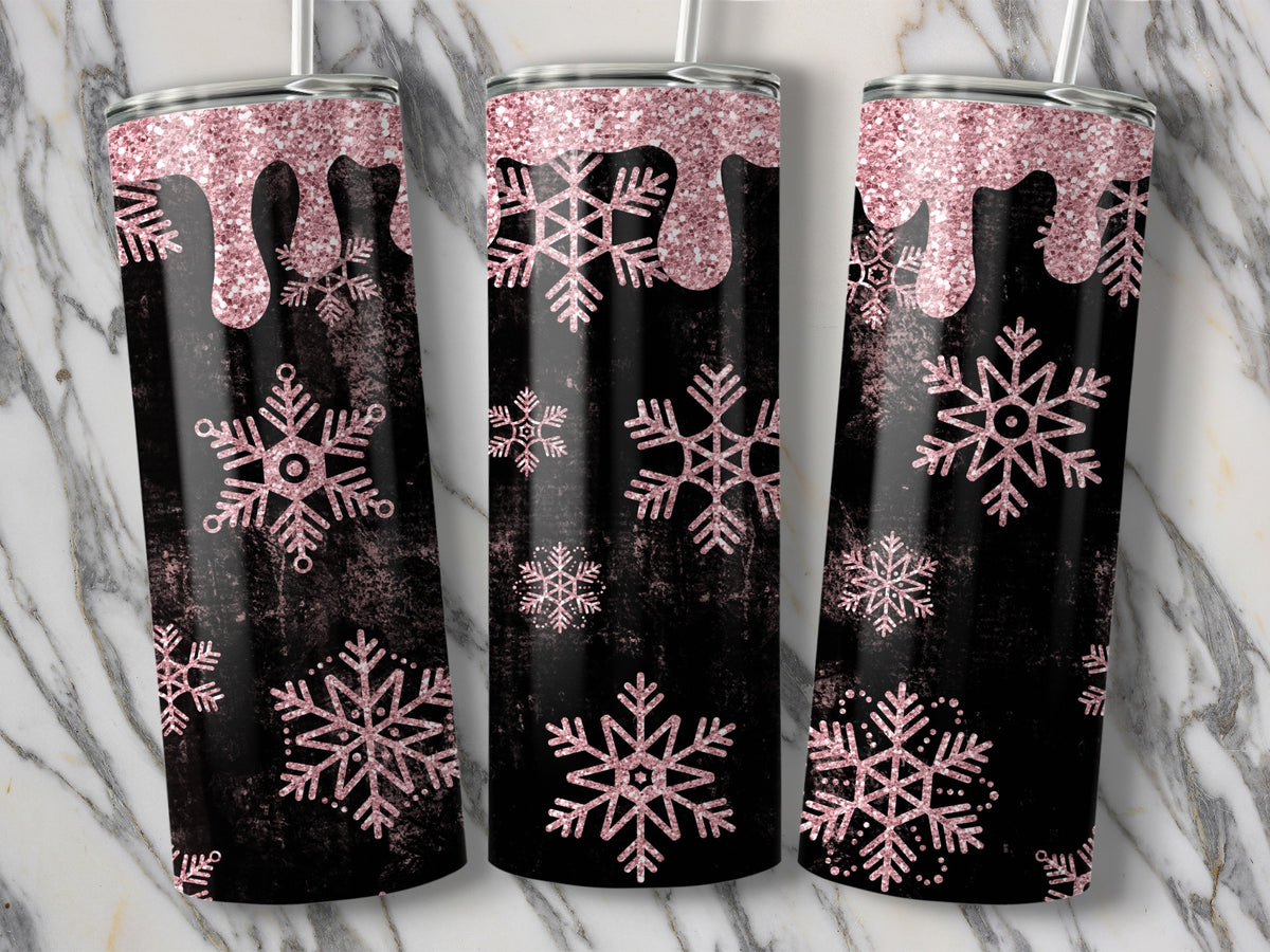 Three tumblers with black background, pink glitter drips, and pink snowflakes.
