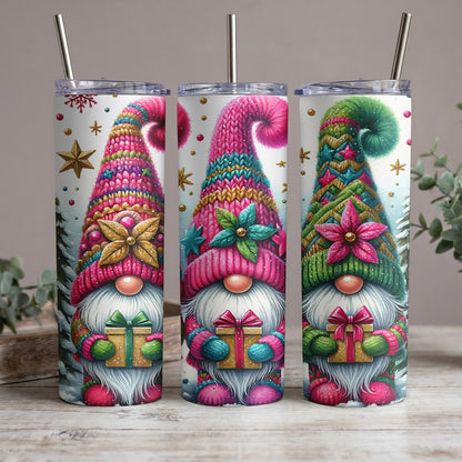 Three tumblers featuring watercolor gnomes holding gifts with festive winter backgrounds.