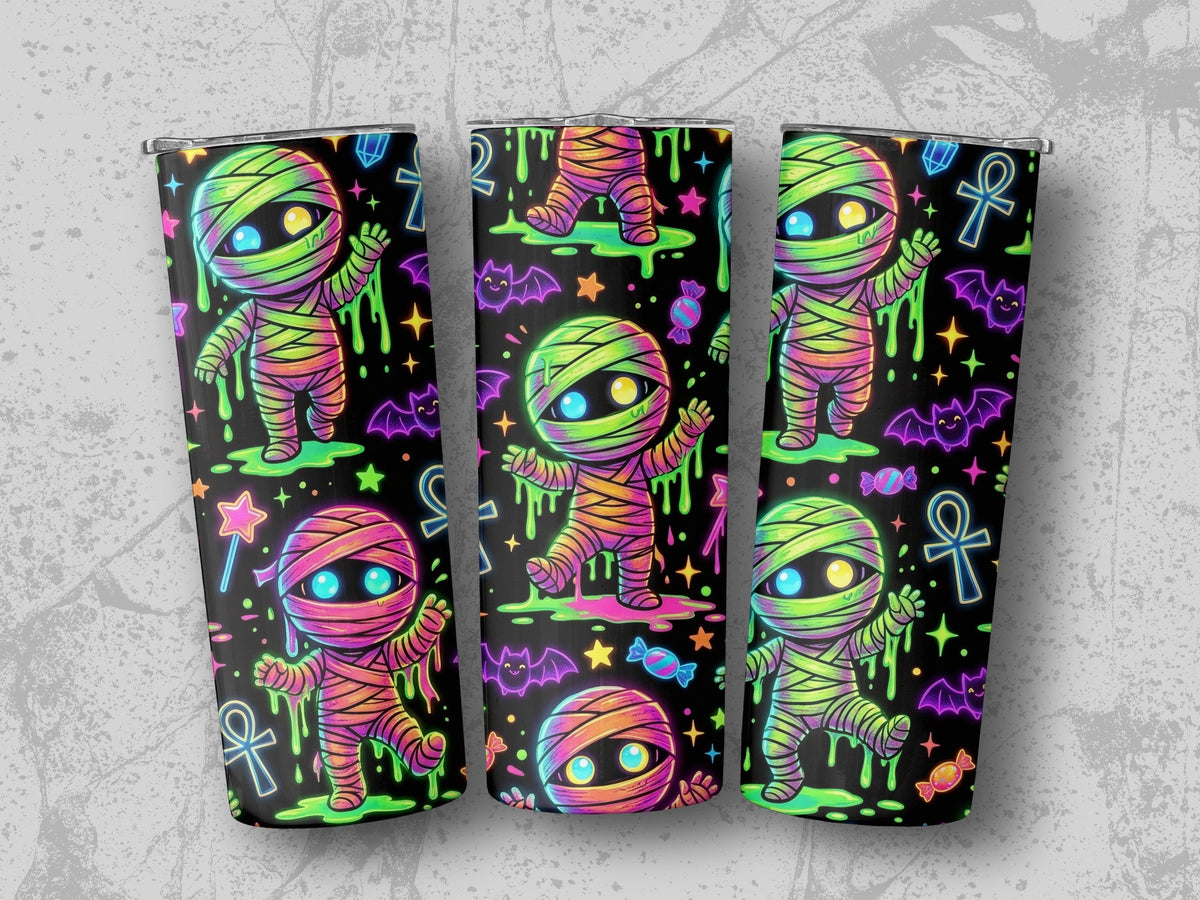 Three tumblers feature a colorful mummy pattern with bats, candy, and ankhs.