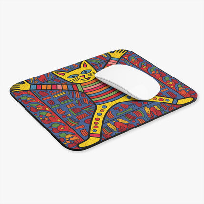 Colorful abstract cat design mousepad with a white mouse.