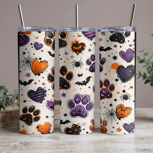 Three tumblers with Halloween paw print and heart designs, including bats and spiders.