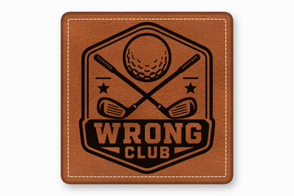 Square brown leather patch with white stitched borders and a black golf-themed logo and text reading WRONG CLUB.