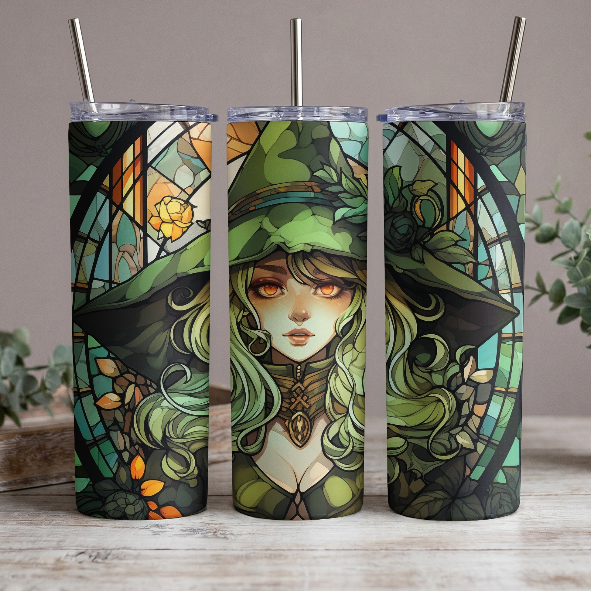 Three tumblers with a green witch and stained-glass design.