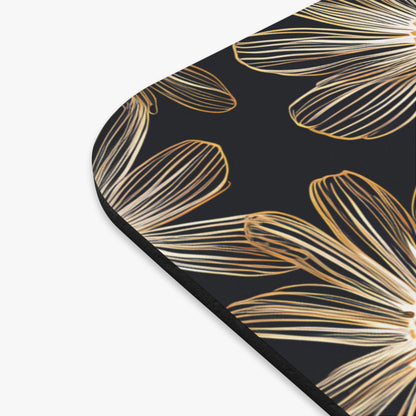 Black surface with a repeating gold line-art flower petal pattern.