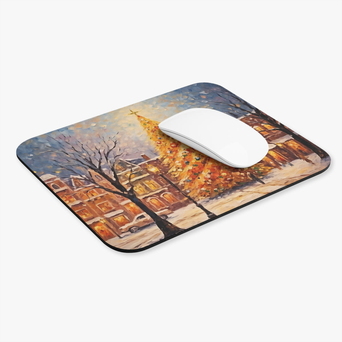 Mousepad featuring an oil painting of a snowy street with buildings and a decorated Christmas tree.