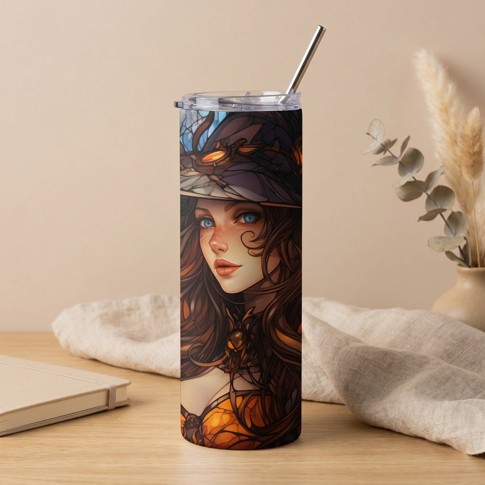 Tumbler with stained-glass art of a woman with blue eyes and flowing brown hair.