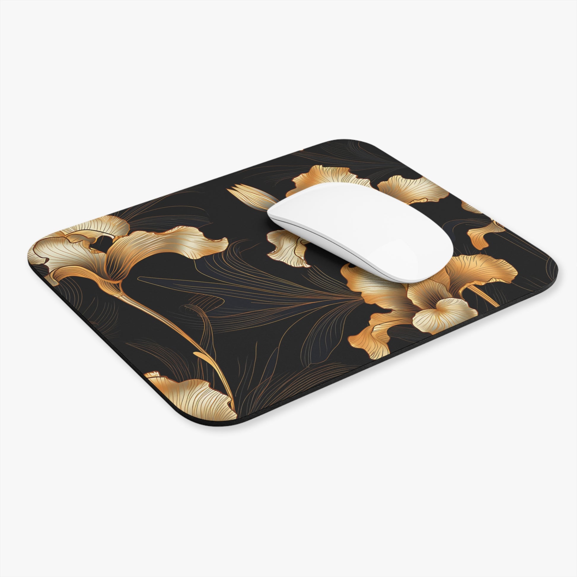 Mousepad with a black background and an intricate gold floral design, featuring a white mouse.