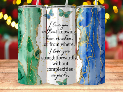 Three tumblers with marble-like designs and inspirational quotes.
