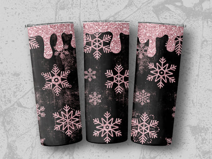 Three tumblers with a black background featuring pink glitter snowflakes and dripping accents.