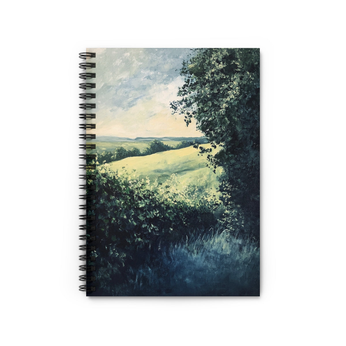 Notebook with a landscape painting of rolling hills and trees under a cloudy sky.