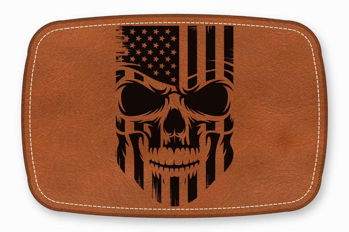 Brown leather patch with rounded corners, white stitching, and a distressed American flag skull graphic.