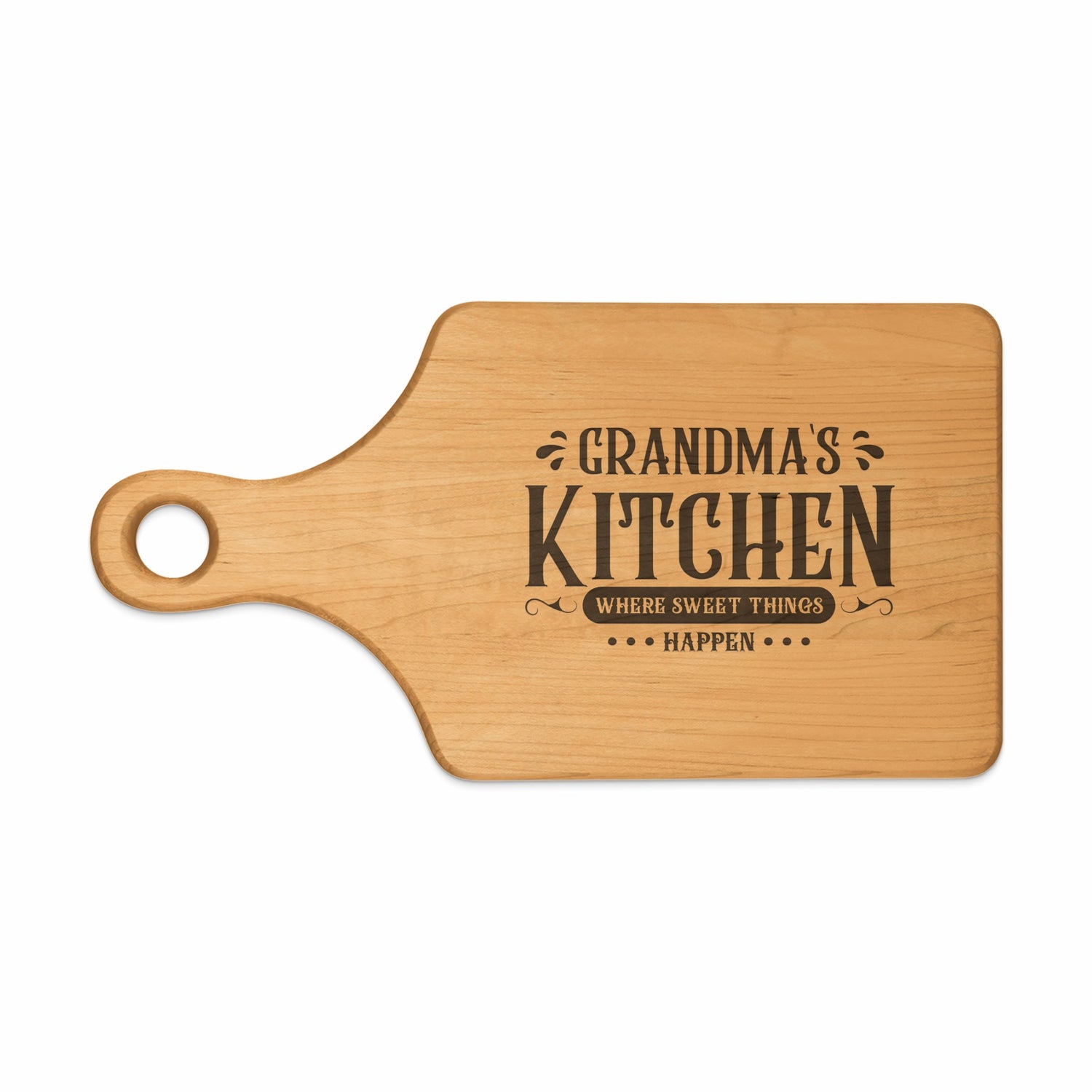 Wooden cutting board with "Grandma's Kitchen Where Sweet Things Happen" engraved text.