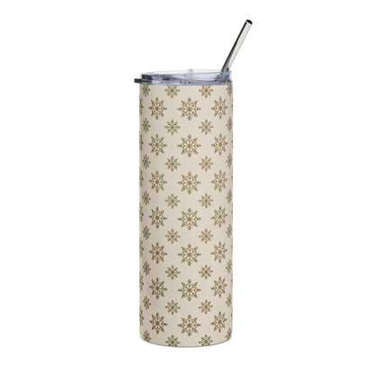 Beige tumbler with a repeating gold snowflake pattern and a silver straw.