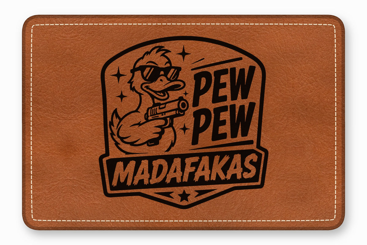 Brown leather patch with a stitched border and a black laser-engraved graphic of a duck holding a gun with the text PEW PEW MADAFAKAS.
