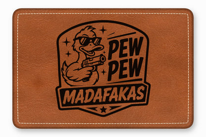 Brown leather patch with a stitched border and a black laser-engraved graphic of a duck holding a gun with the text PEW PEW MADAFAKAS.