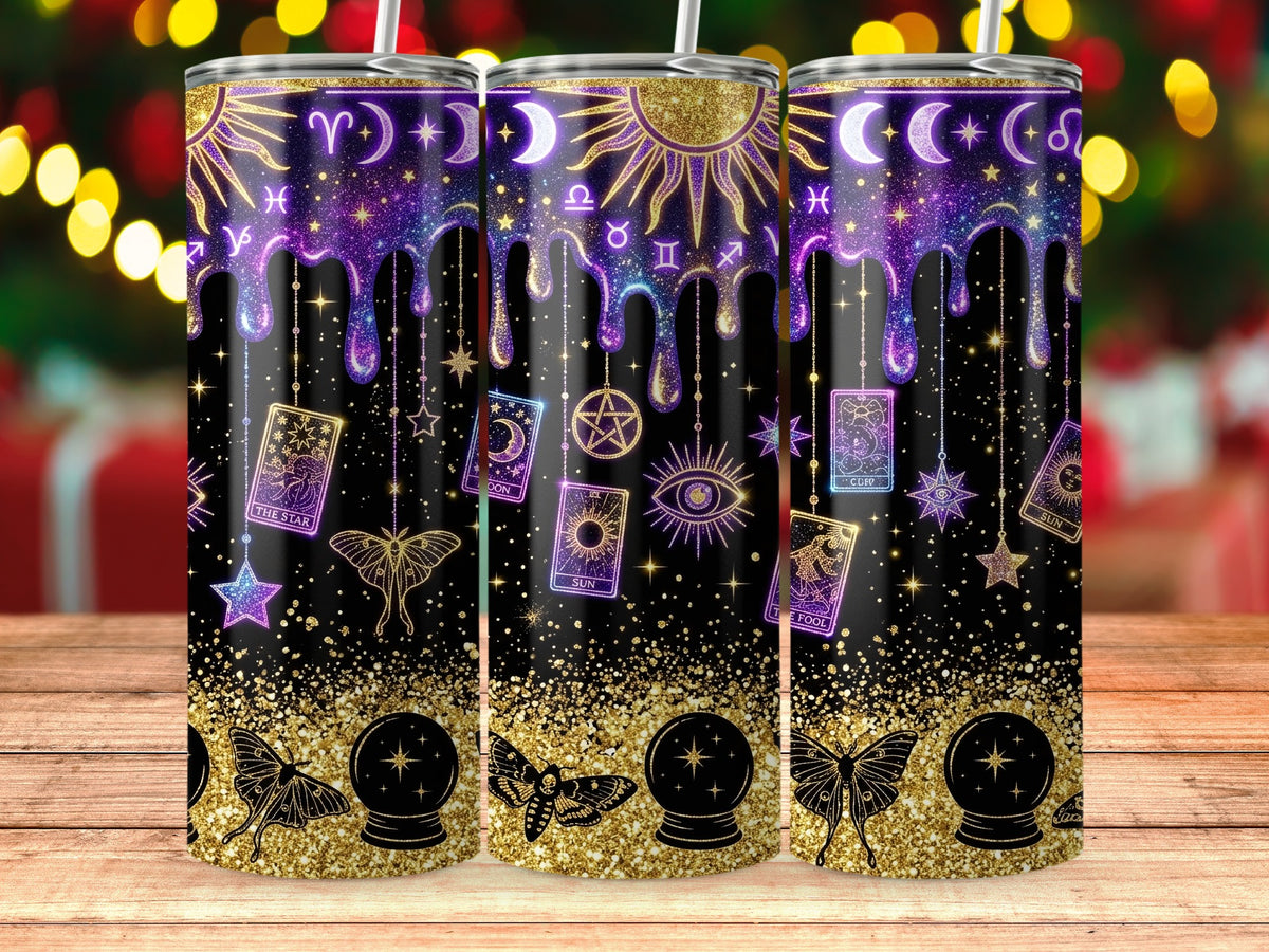 Three tumblers with celestial and tarot designs, including sun, moon, stars, and cards.