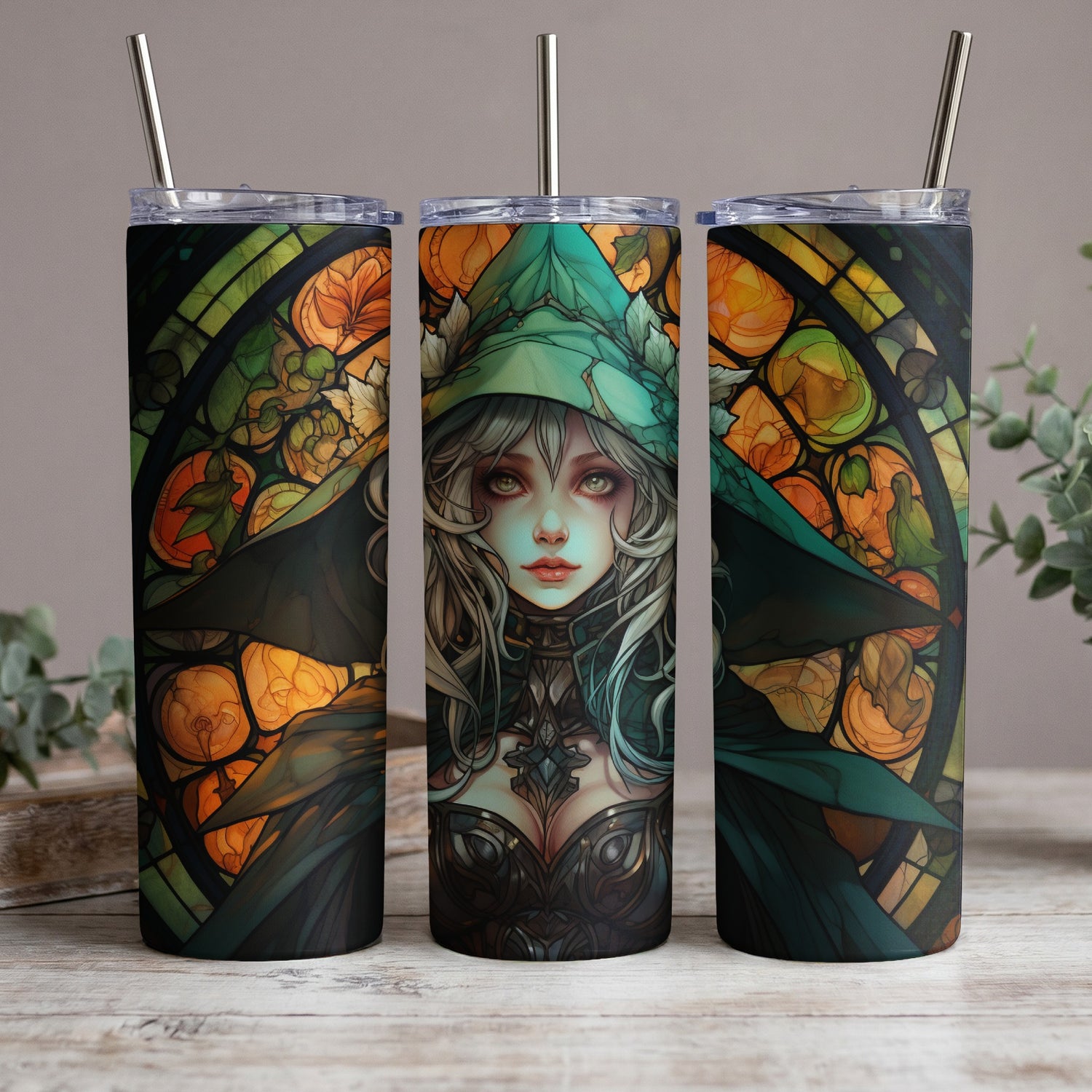 Three tumblers with stained-glass style witch and pumpkin design.