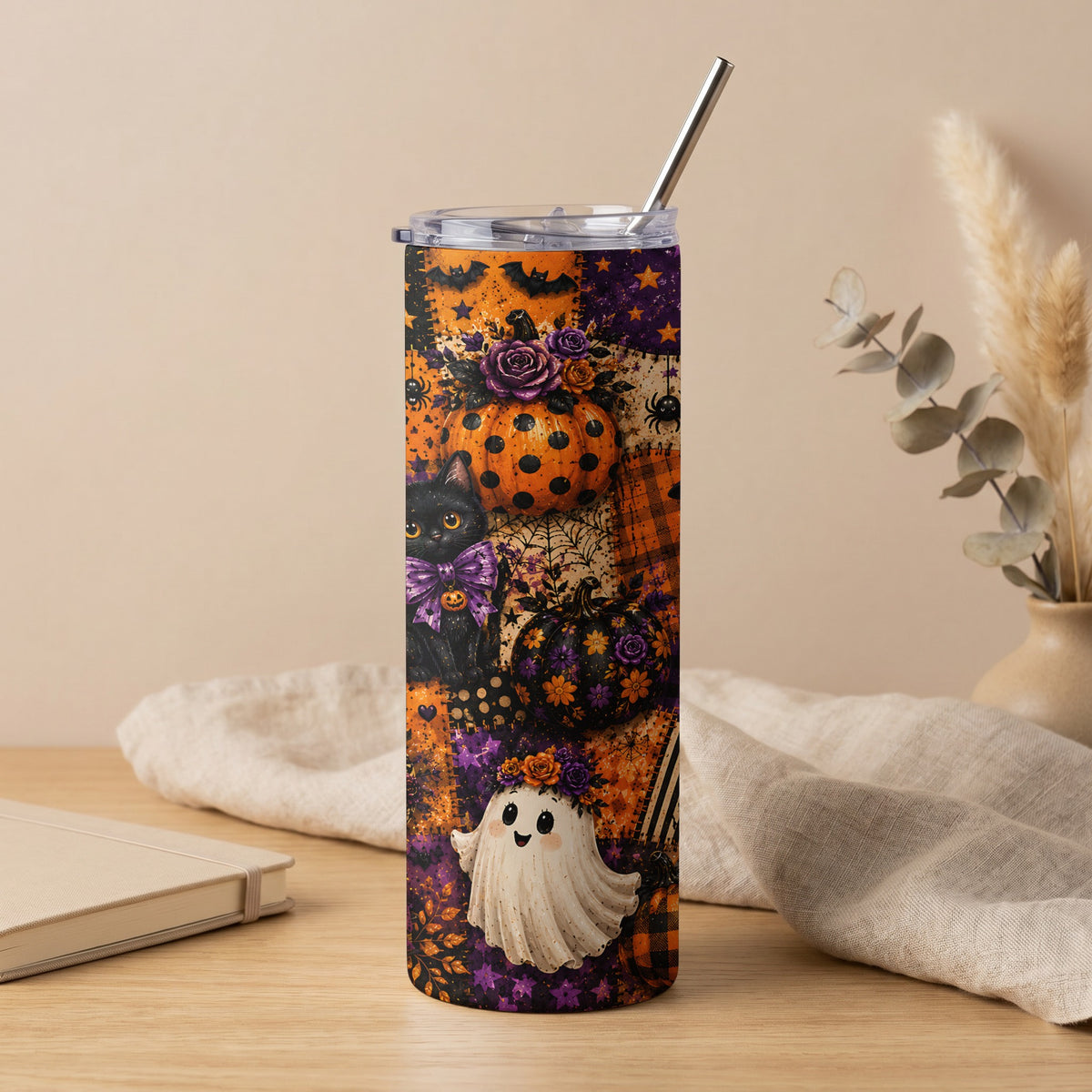 Halloween tumbler with ghost, black cat, pumpkins, and bats.