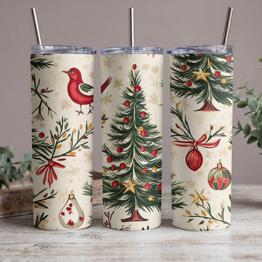 Three tumblers with a cream background, featuring red bird, Christmas tree, and ornament patterns.