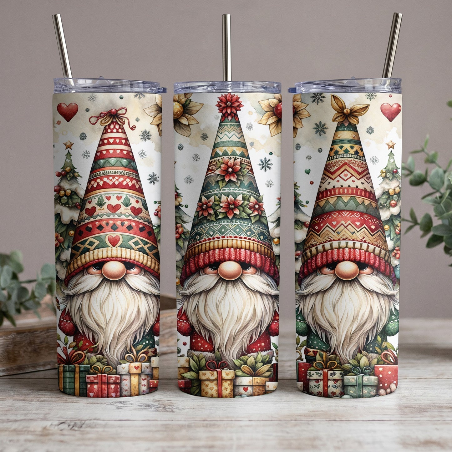 Three gnomes with festive hats and white beards stand in front of Christmas trees and gifts.