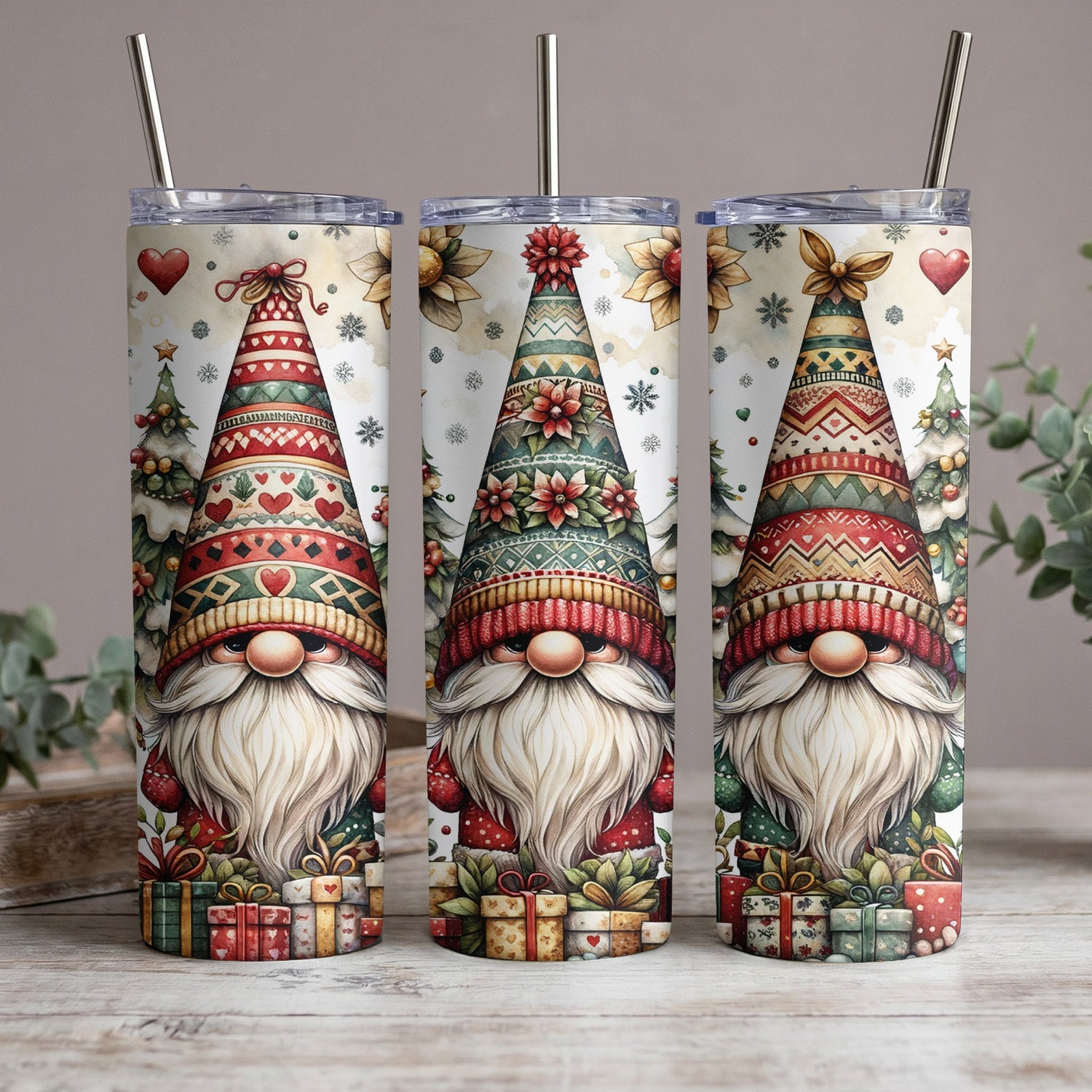 Three gnomes with festive hats and white beards stand in front of Christmas trees and gifts.