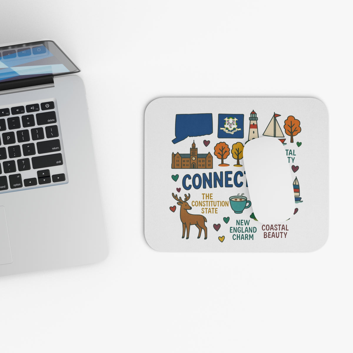 Mousepad with Connecticut state map, flag, lighthouse, sailboat, and deer.