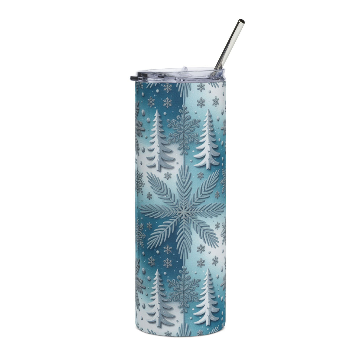 Blue tumbler with white snowflakes and trees, and a metal straw.