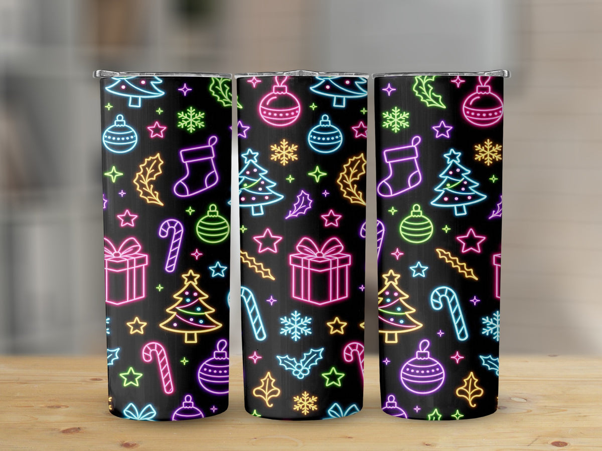 Three tumblers with a black background and colorful neon Christmas icons.
