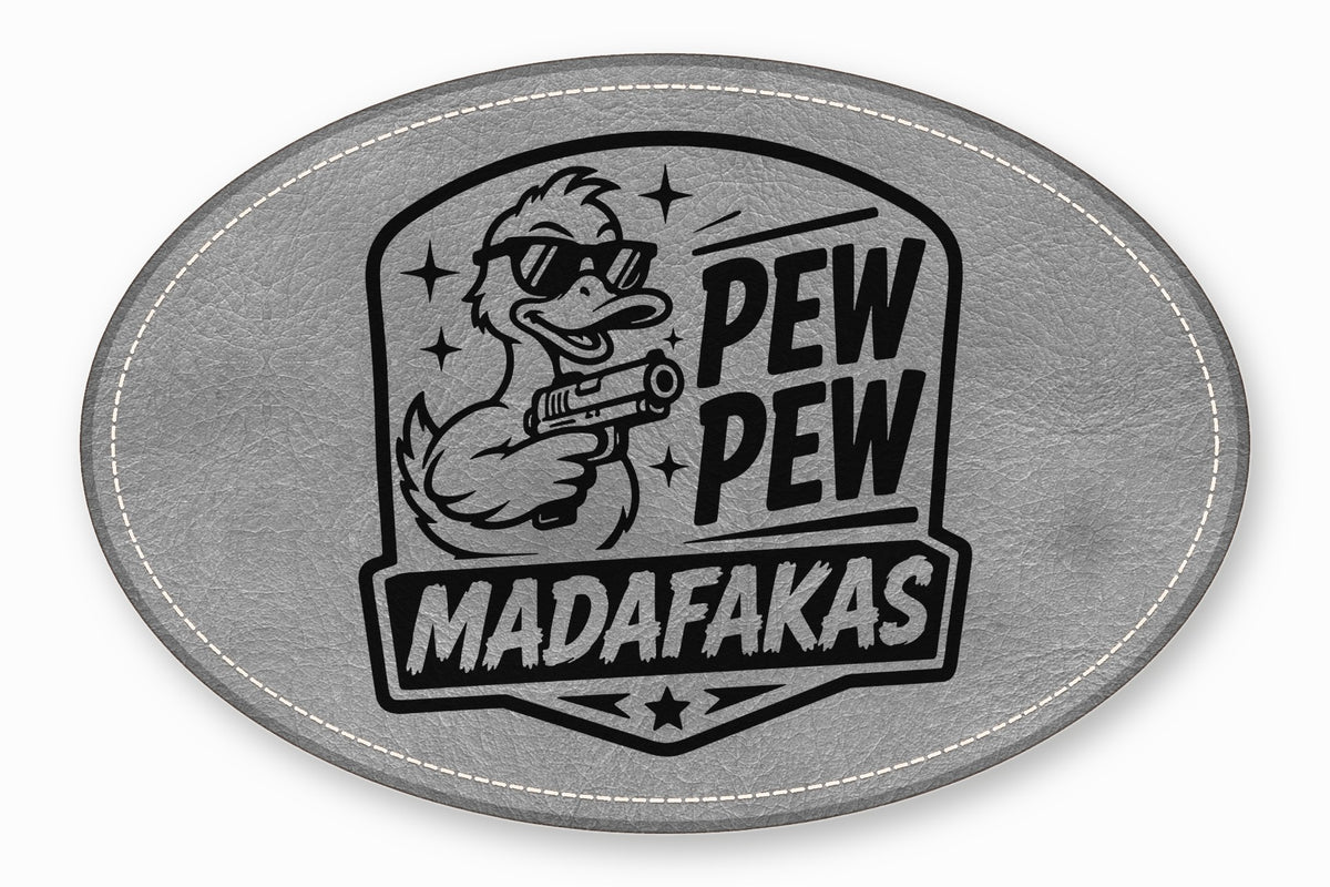 An oval gray leather patch featuring a duck wearing sunglasses and holding a gun, with text that reads PEW PEW MADAFAKAS.