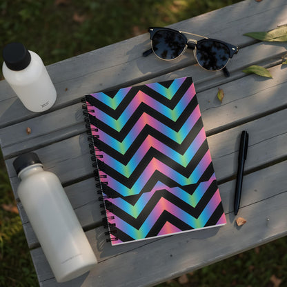 Spiral notebook with black, iridescent chevron pattern and black spiral binding.
