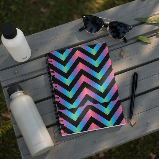 Spiral notebook with black, iridescent chevron pattern and black spiral binding.