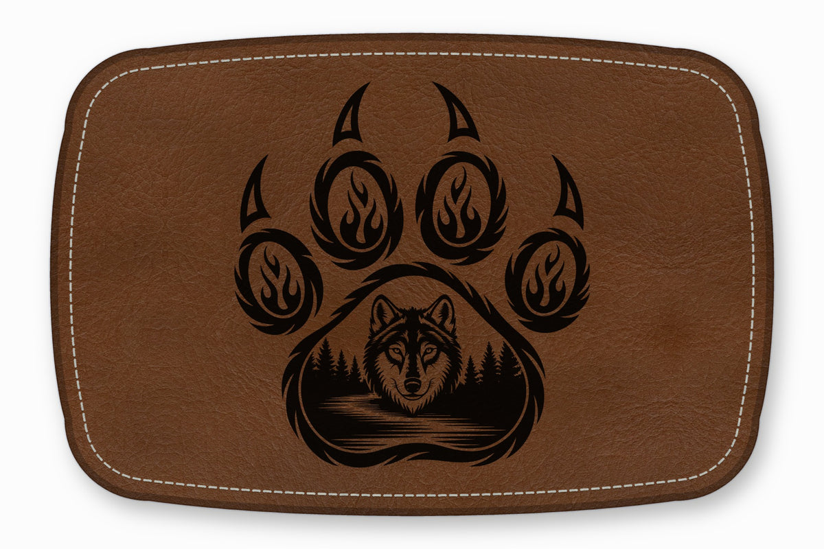 Brown leather patch with white stitched border, featuring a black laser-engraved wolf and claw graphic.