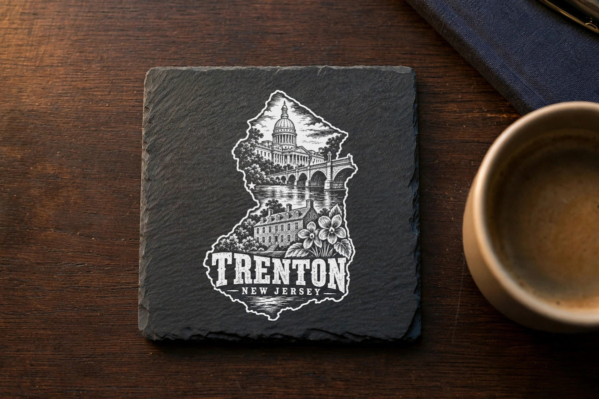 Square dark slate coaster featuring an engraved white outline of New Jersey with Trenton landmarks.