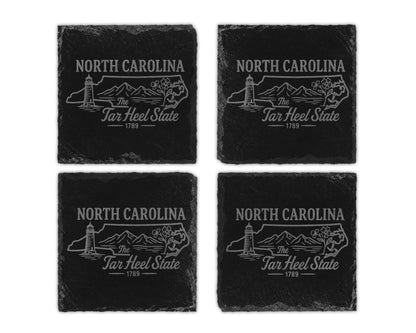 Four black slate coasters etched with "North Carolina, The Tar Heel State 1789."