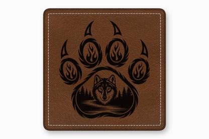 Square brown leather patch with white stitched border and laser-engraved wolf face inside a paw print.