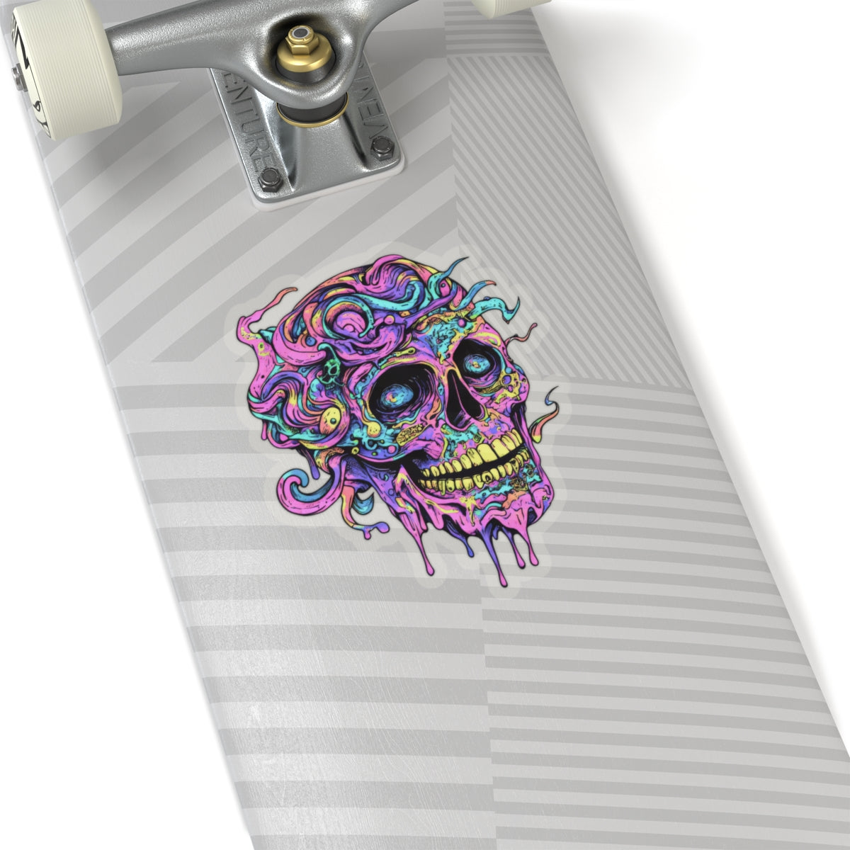 Skateboard deck with colorful psychedelic skull sticker and silver truck.